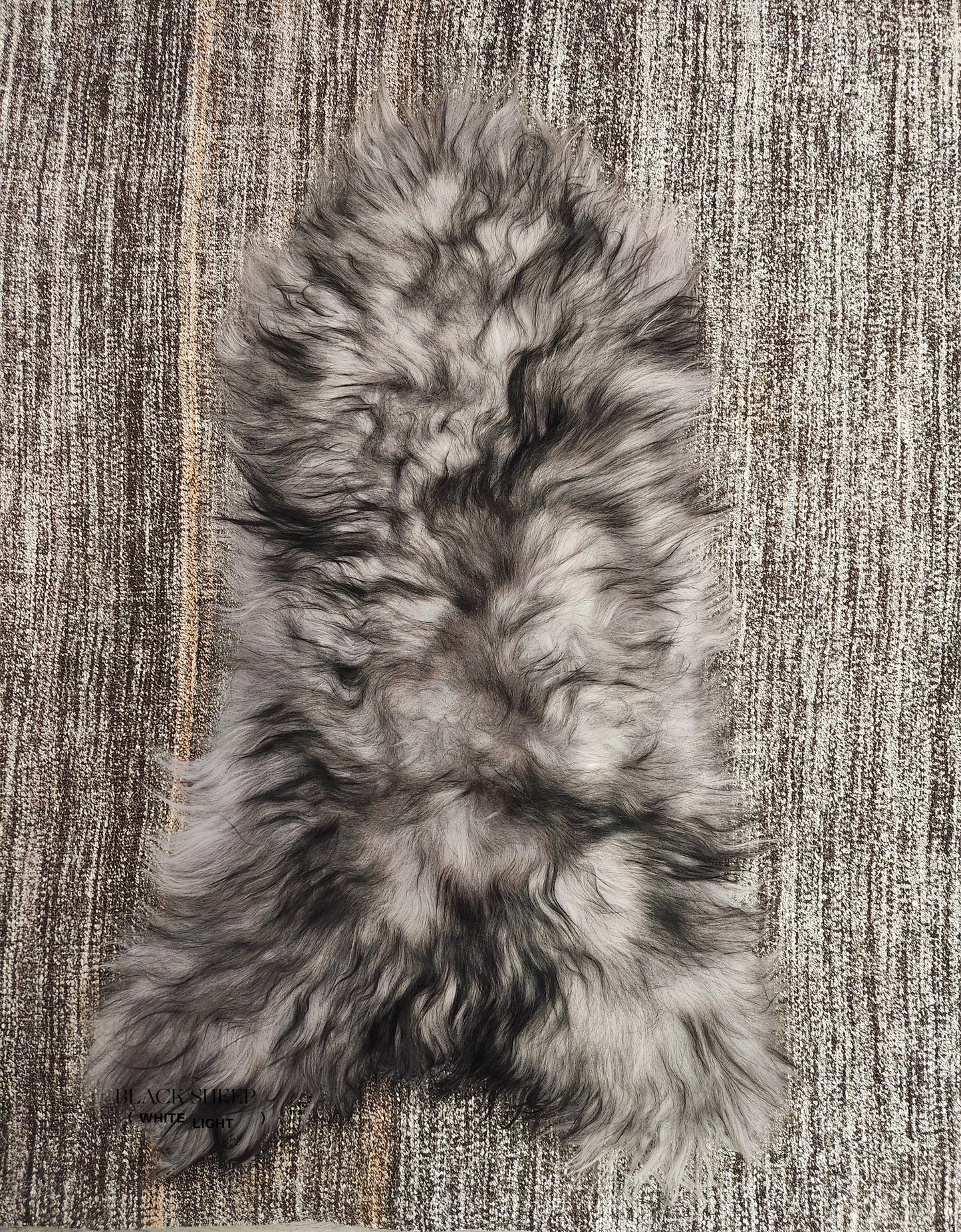 ONE OF THE KIND Icelandic Grey Dark Ends Sheepskin - Black Sheep (White Light)