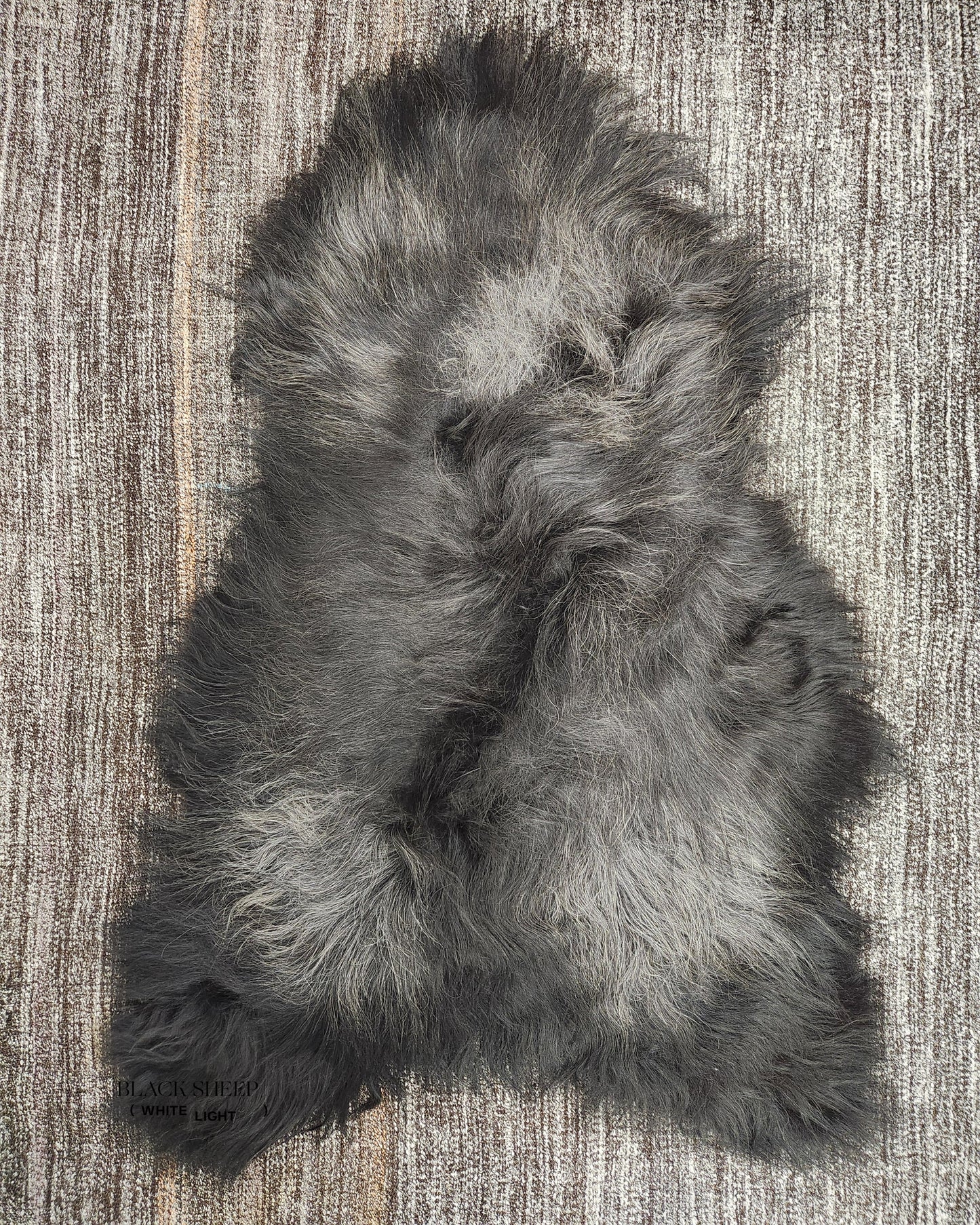 ONE OF THE KIND Icelandic Black Salt and Pepper Sheepskin - Black Sheep (White Light)