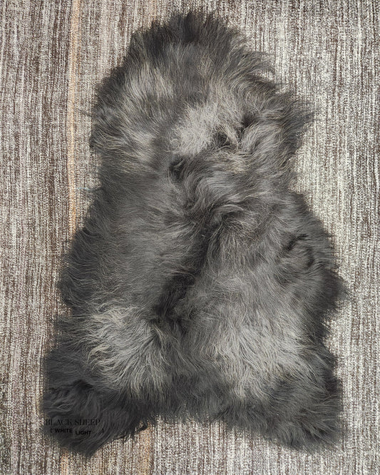 ONE OF THE KIND Icelandic Black Salt and Pepper Sheepskin - Black Sheep (White Light)