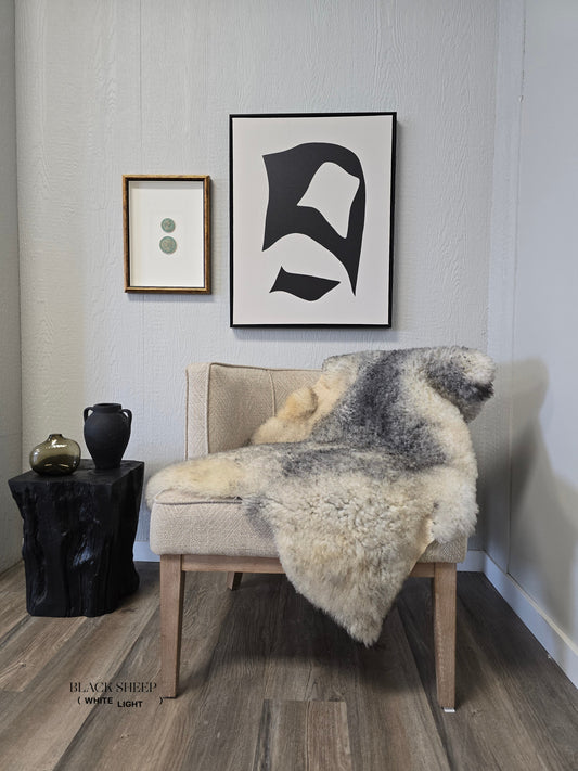 ONE OF THE KIND Gotland White and Grey Medium Wool Sheepskin - Black Sheep (White Light)
