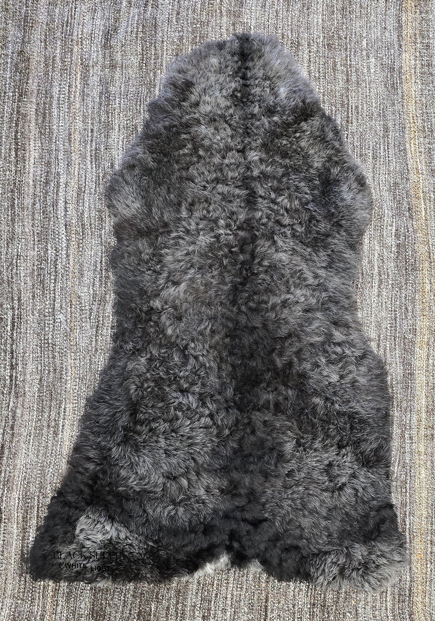 ONE OF THE KIND Icelandic Shorn Black Salt and Pepper Sheepskin - Black Sheep (White Light)