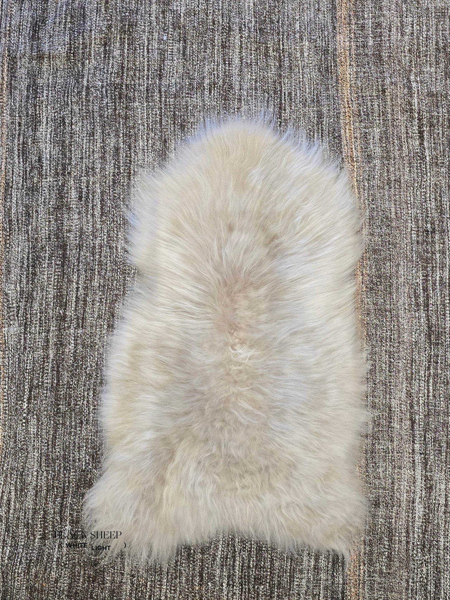 ONE OF THE KIND Long Wool Icelandic Linen Sheepskin - Black Sheep (White Light)