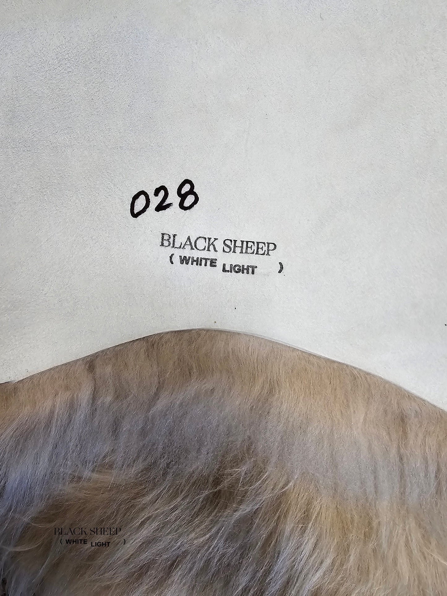 ONE OF THE KIND Long Wool Icelandic Linen Sheepskin - Black Sheep (White Light)