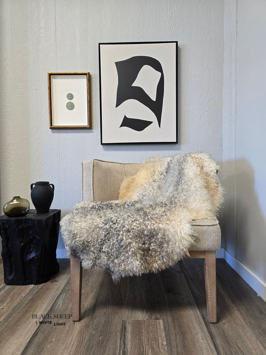 ONE OF THE KIND Gotland White and Grey Medium Wool Sheepskin - Black Sheep (White Light)