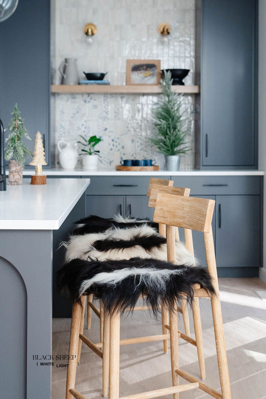 Black Spotted Icelandic Sheepskin Chair Pad | Random - Black Sheep (White Light)