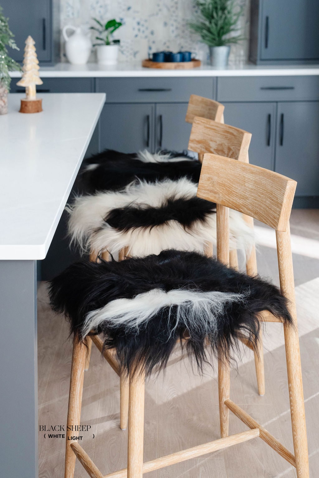 Black Spotted Icelandic Sheepskin Chair Pad | Random - Black Sheep (White Light)