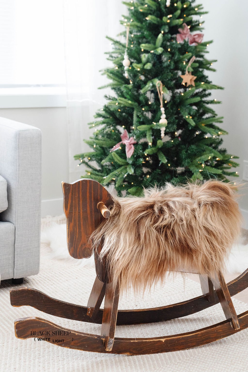 Brown Icelandic Sheepskin Chair Pad - Black Sheep (White Light)
