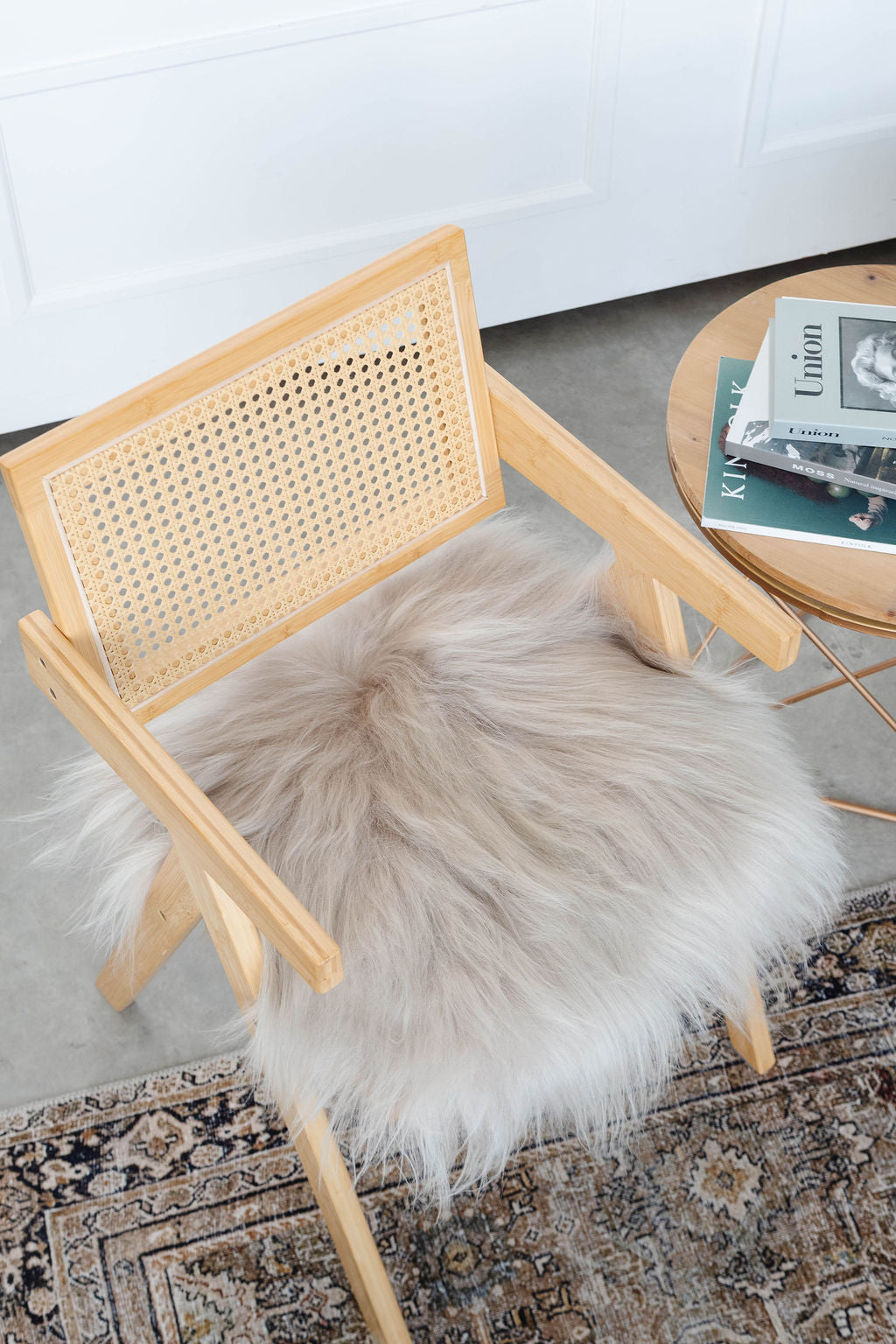 Nude Icelandic Sheepskin Chair Pad | Black Sheep (White Light)