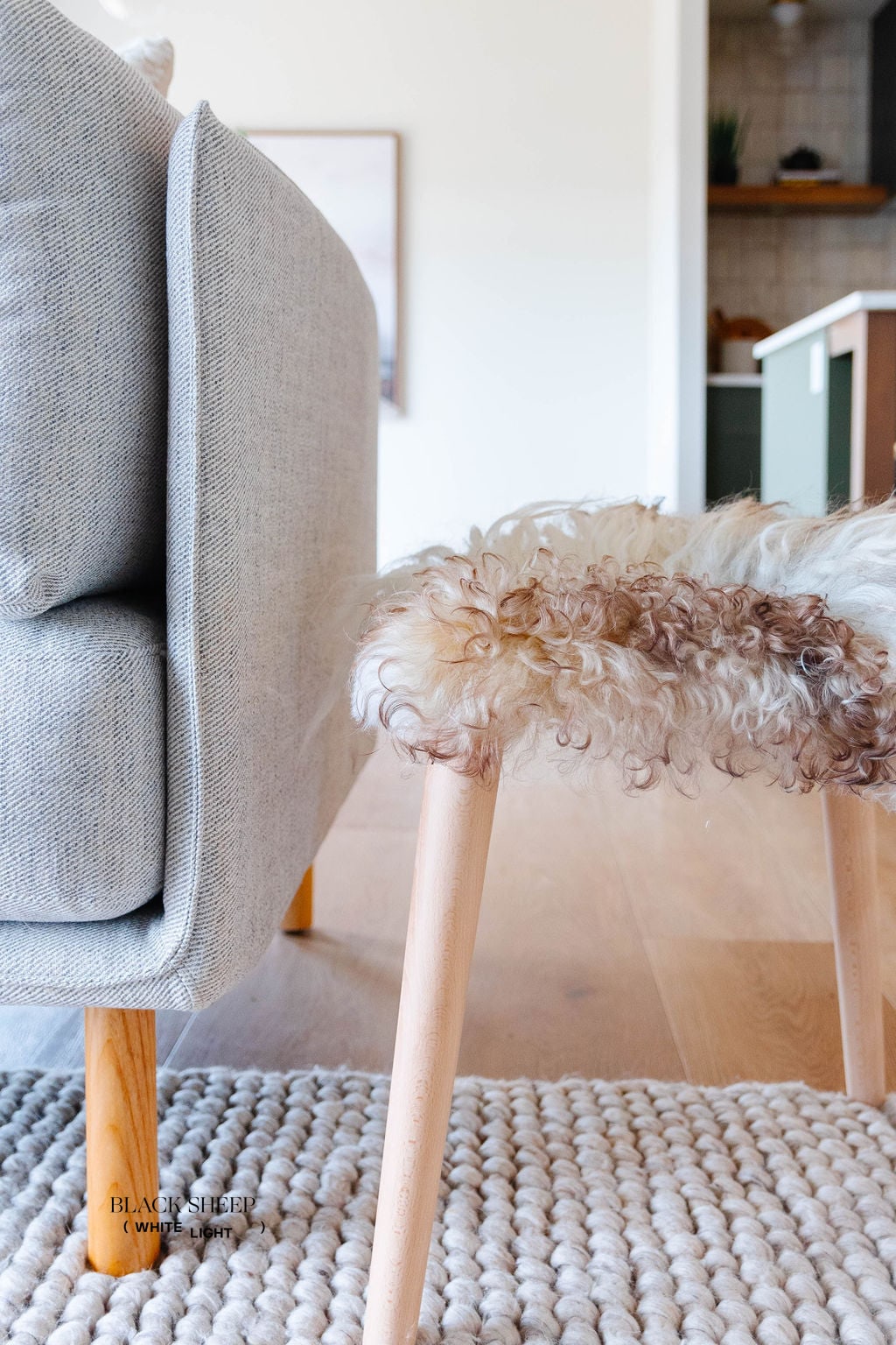Mélange Sheepskin Stool, cushionless - Black Sheep (White Light)