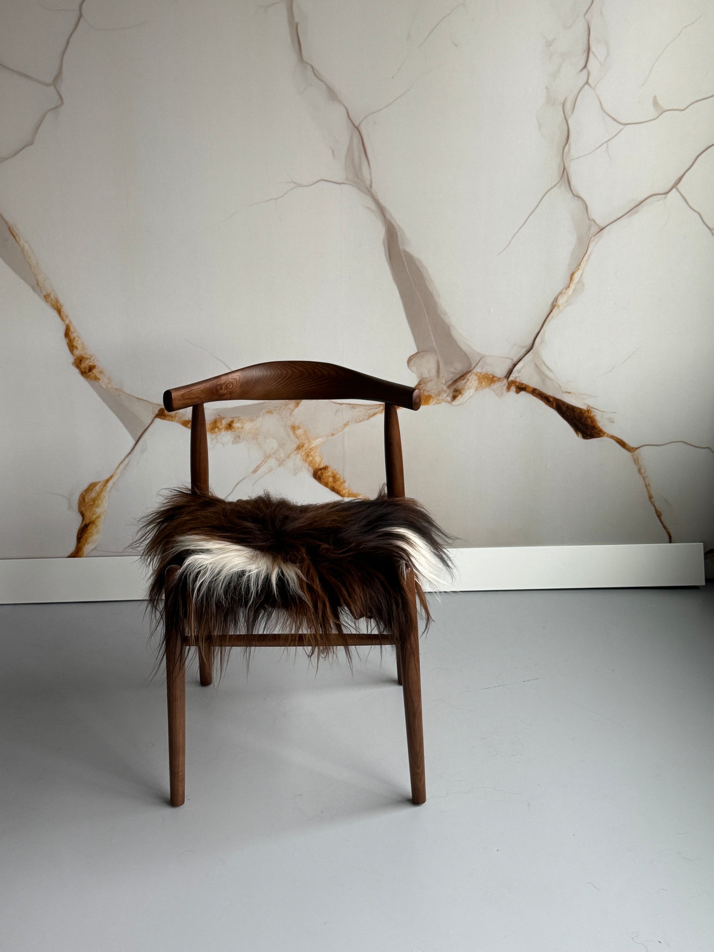 Rusty Brown and White Spotted Icelandic Sheepskin Chair Pad