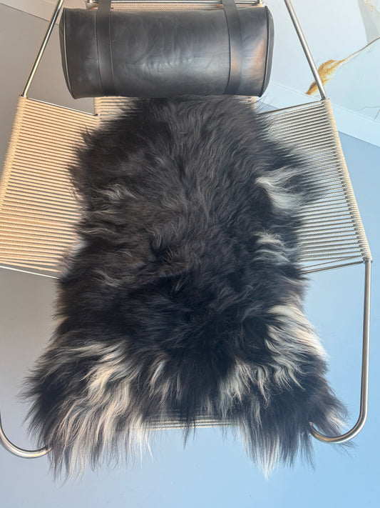 ONE OF A KIND Black Long wool Icelandic Sheepskin with White Side Locks