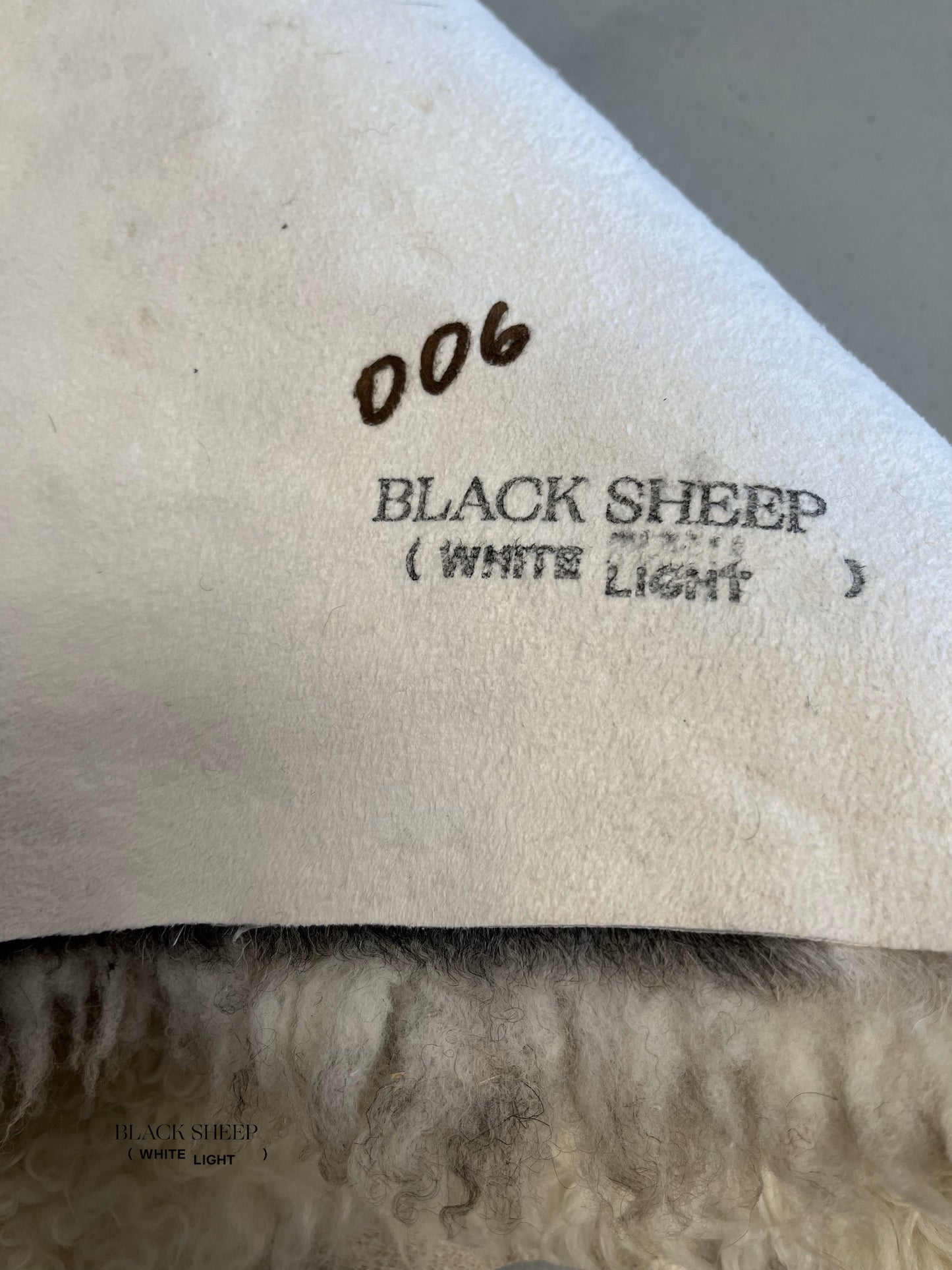 ONE OF THE KIND Gotland White Medium Wool Sheepskin - Black Sheep (White Light)
