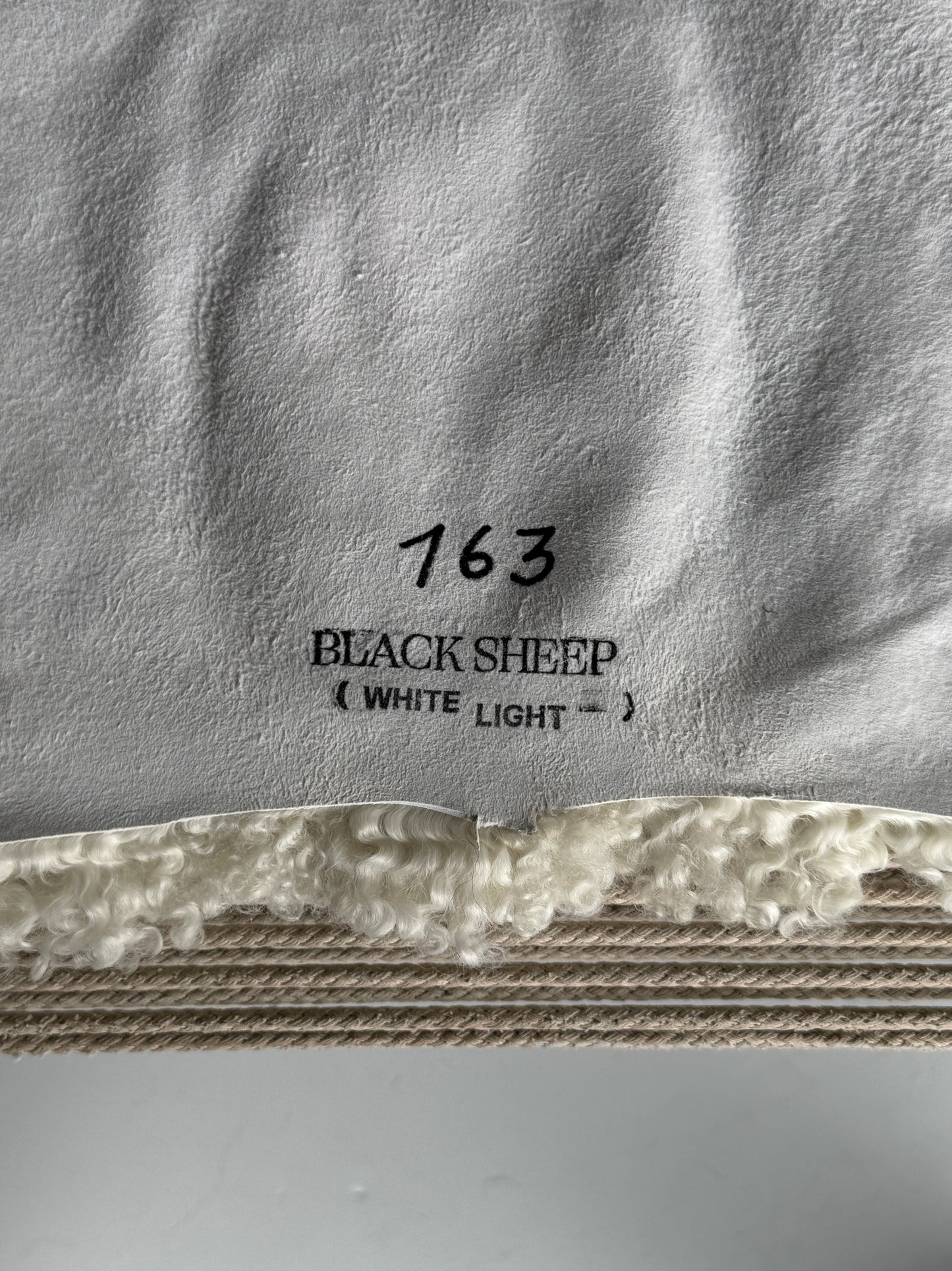 ONE OF A KIND White Medium Wool Gotland Sheepskin with baby grey