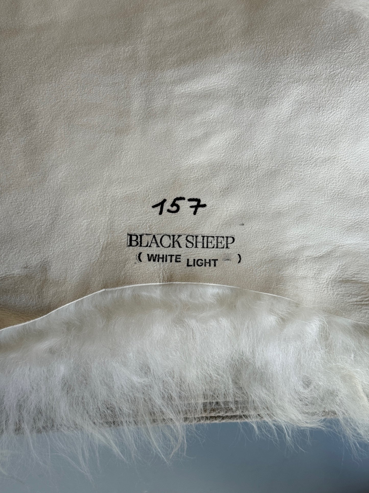 ONE OF A KIND White with single Brown/Grey spot Icelandic Sheepskin