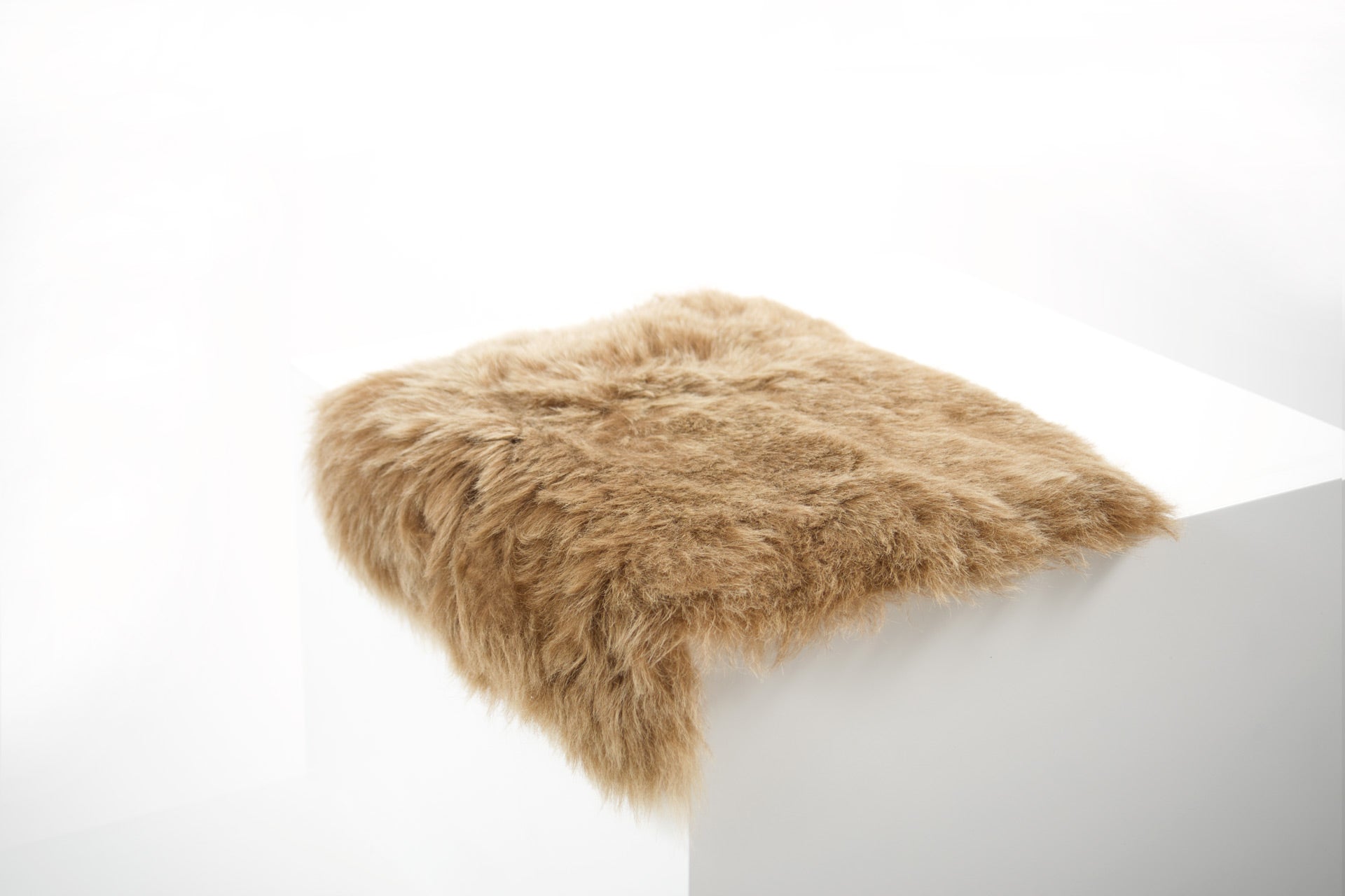 Shorn Brown Icelandic Sheepskin Chair Pad - Black Sheep (White Light)