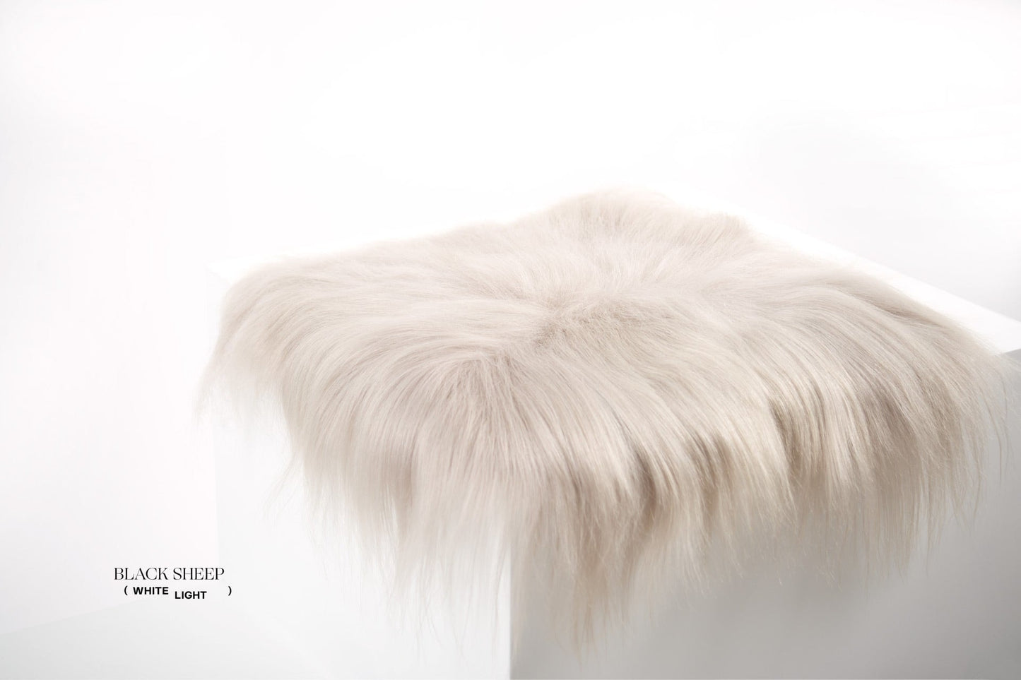 Linen Icelandic Sheepskin Chair Pad - Black Sheep (White Light)