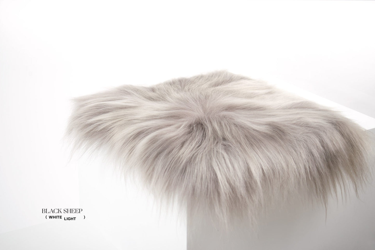 Mineral Icelandic Sheepskin Chair Pad - Black Sheep (White Light)