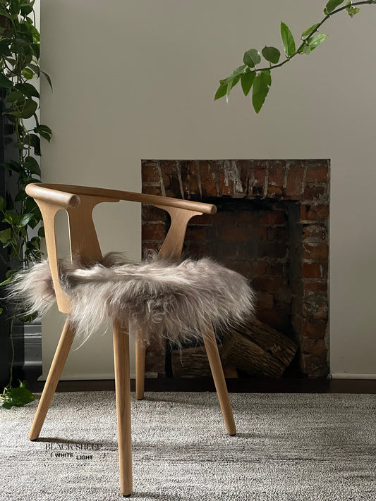 Taupe Icelandic Sheepskin Chair Pad - Black Sheep (White Light)