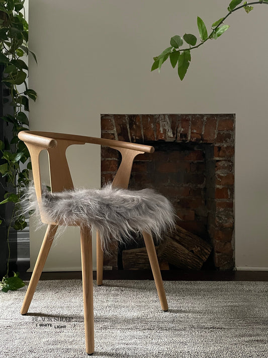 Mineral Icelandic Sheepskin Chair Pad - Black Sheep (White Light)