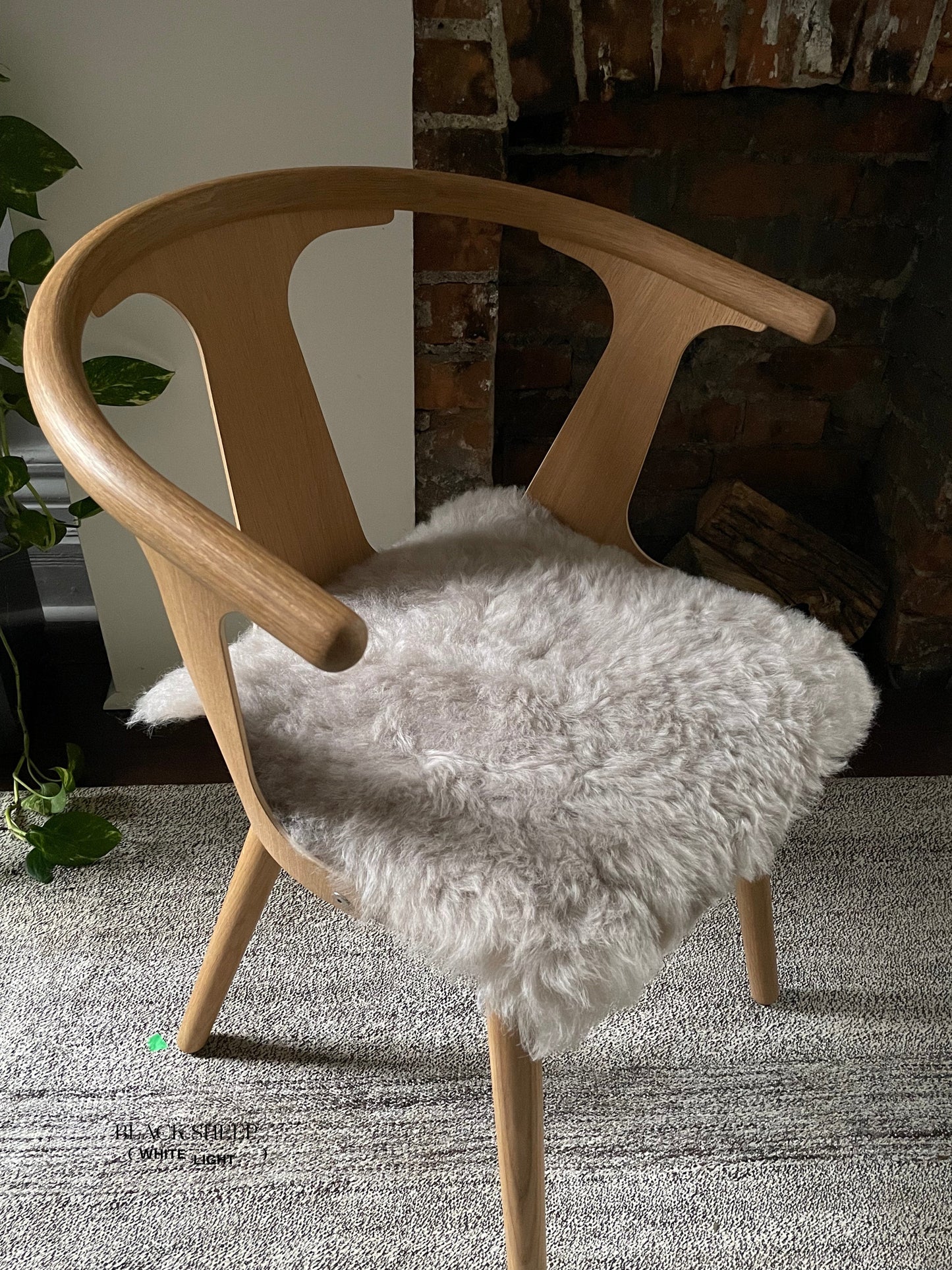 Shorn Nude Icelandic Sheepskin Chair Pad - Black Sheep (White Light)