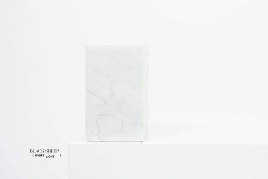 Bianco Carrara Marble Asymmetric Book Ends - Black Sheep (White Light)