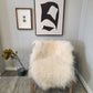 ONE OF THE KIND Icelandic White Sheepskin - Black Sheep (White Light)