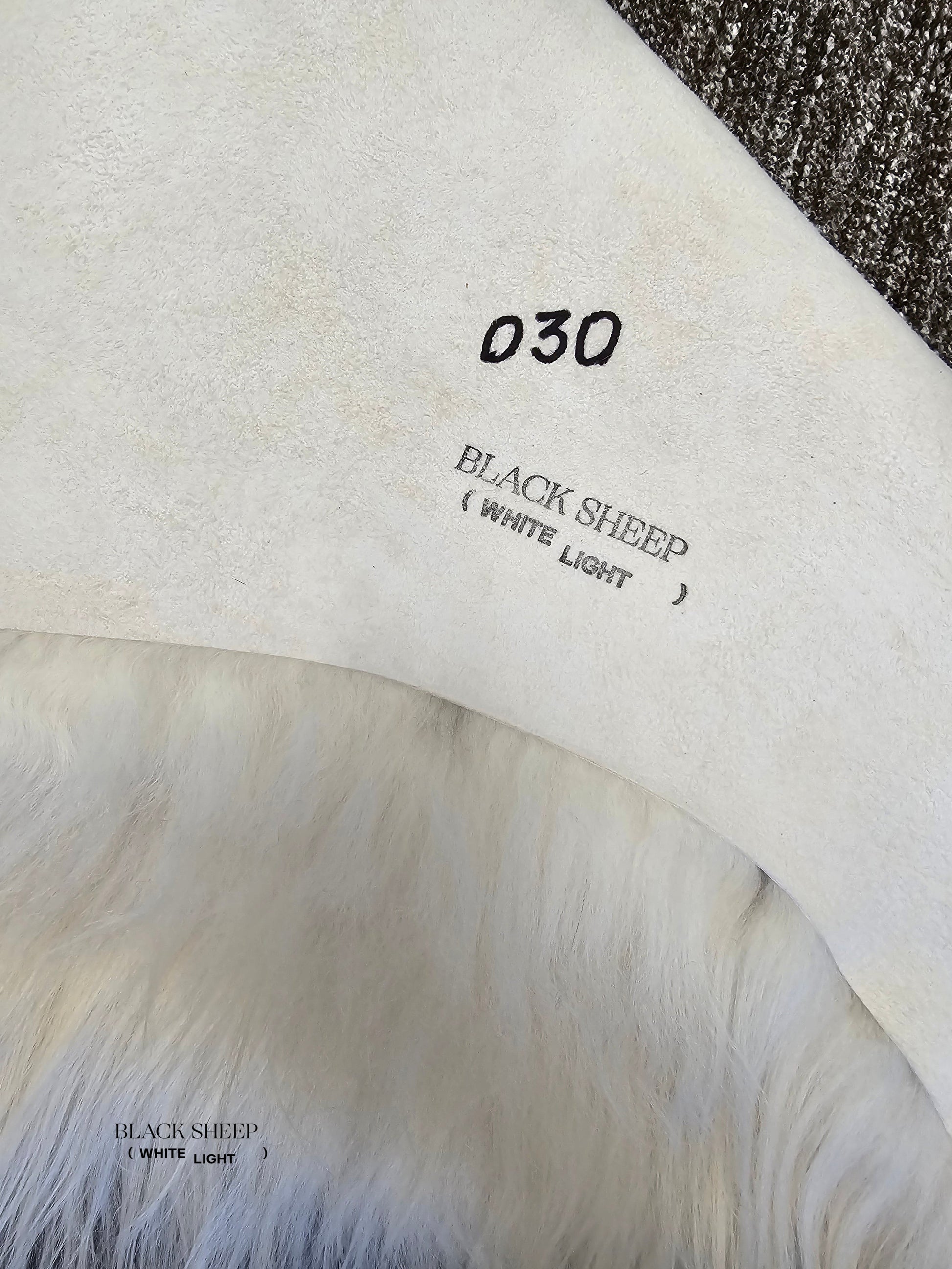 ONE OF THE KIND Icelandic White Sheepskin with Small Black Spot - Black Sheep (White Light)