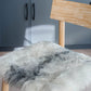 Shorn Grey Icelandic Sheepskin Chair Pad - Black Sheep (White Light)