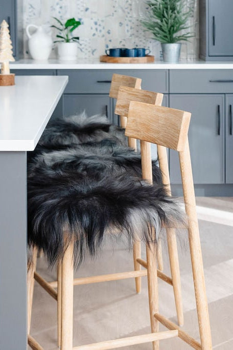 Dark Grey Icelandic Sheepskin Chair Pad - Black Sheep (White Light)