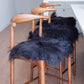 Cojín de silla de piel de oveja islandesa negra