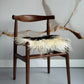 White and Black Spotted Curly Icelandic Sheepskin Chair Pad