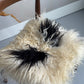 White and Black Spotted Curly Icelandic Sheepskin Chair Pad