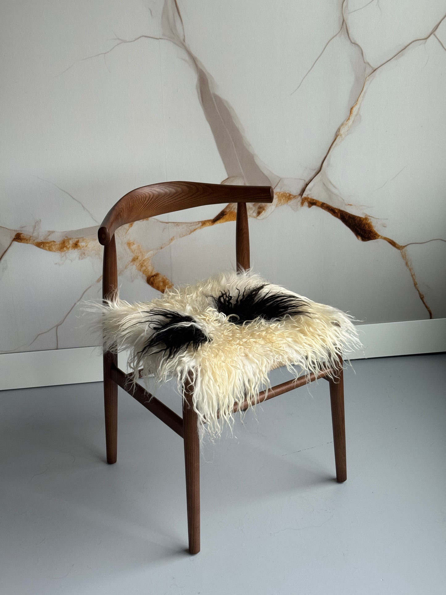 White and Black Spotted Curly Icelandic Sheepskin Chair Pad