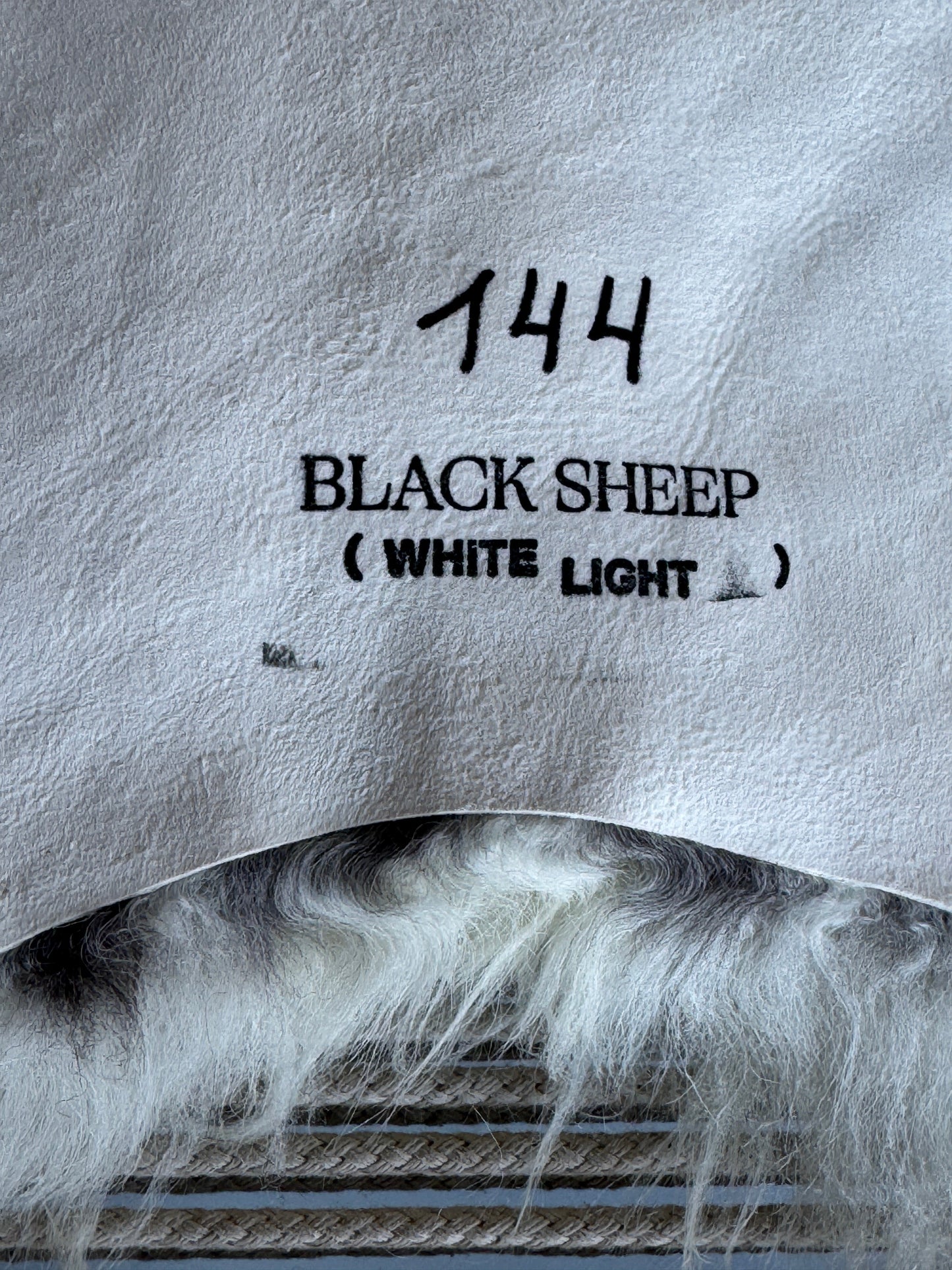 ONE OF A KIND White with Black Spot Icelandic Sheepskin