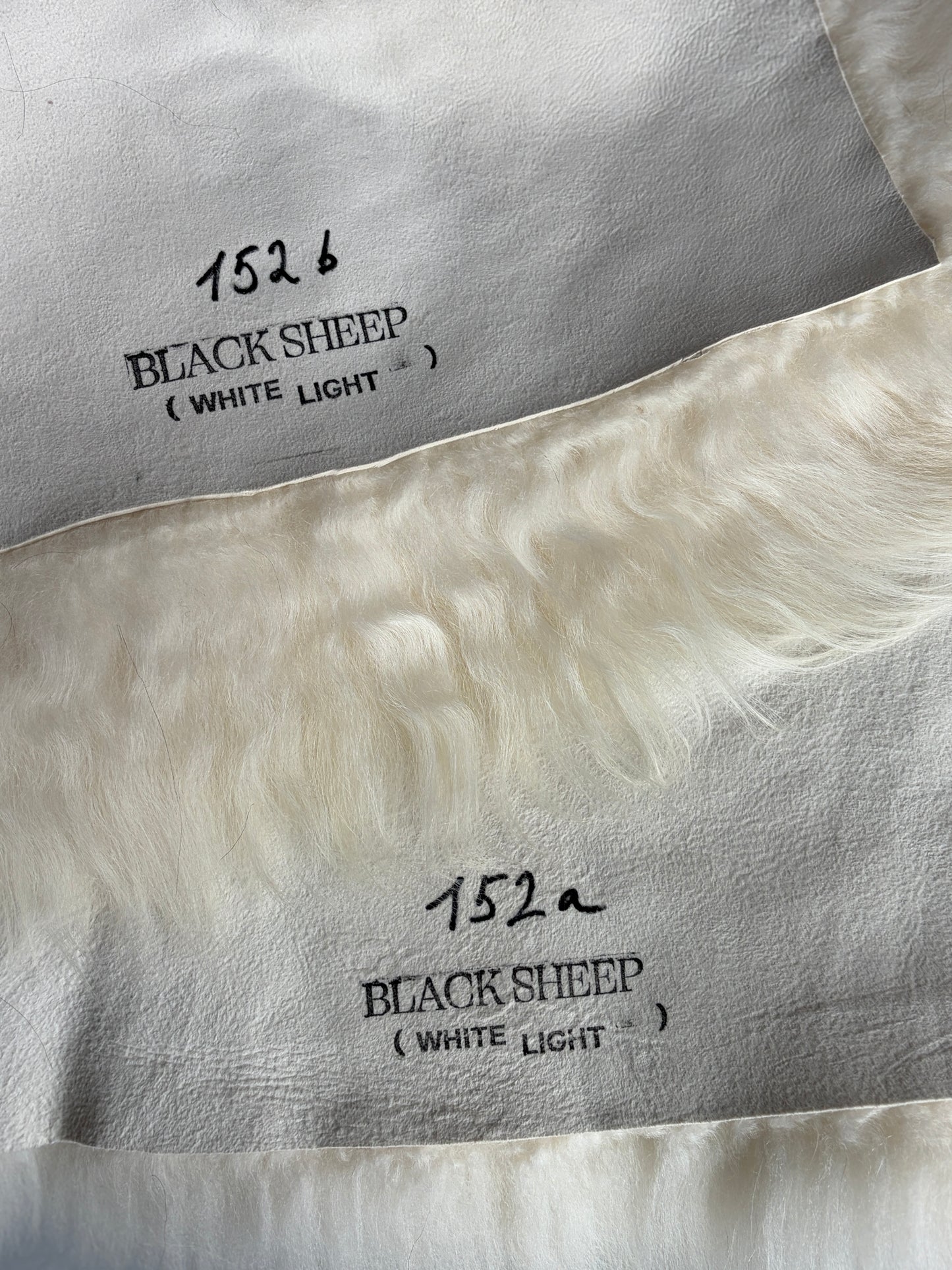 ONE OF A KIND Matching Pair of Black Spotted Icelandic Sheepskin chair pads