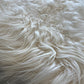 ONE OF THE KIND Icelandic White Sheepskin - Black Sheep (White Light)