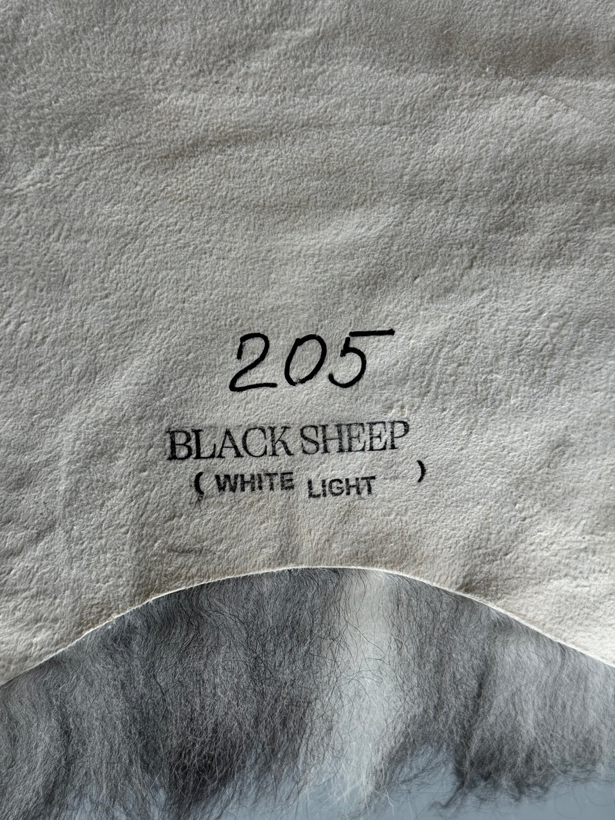ONE OF A KIND Black Icelandic Sheepskin with white locks