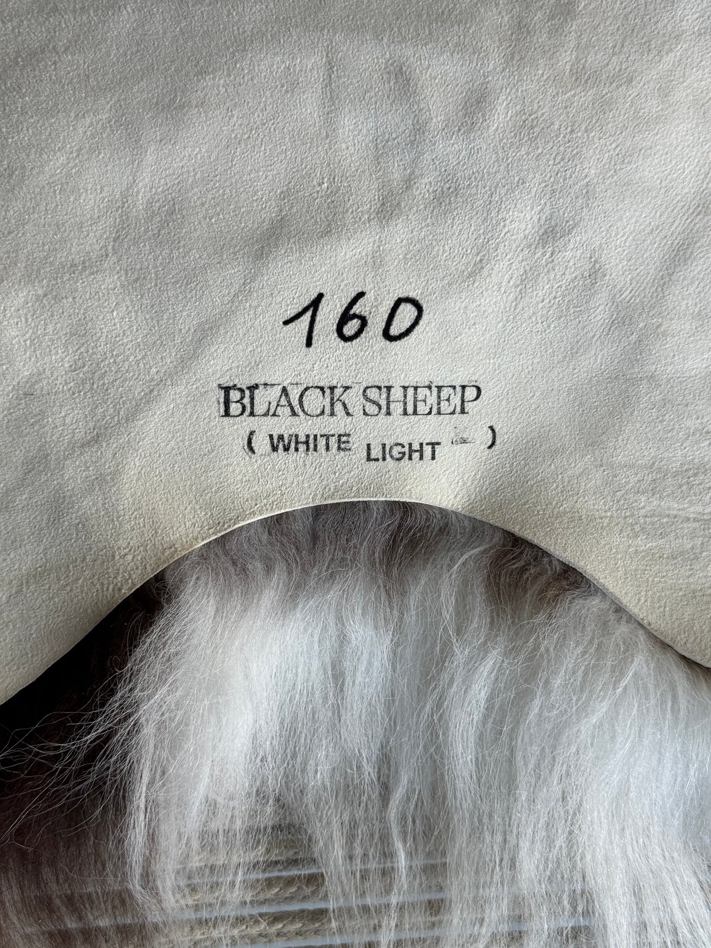 ONE OF A KIND White with single Brown spot Icelandic Sheepskin