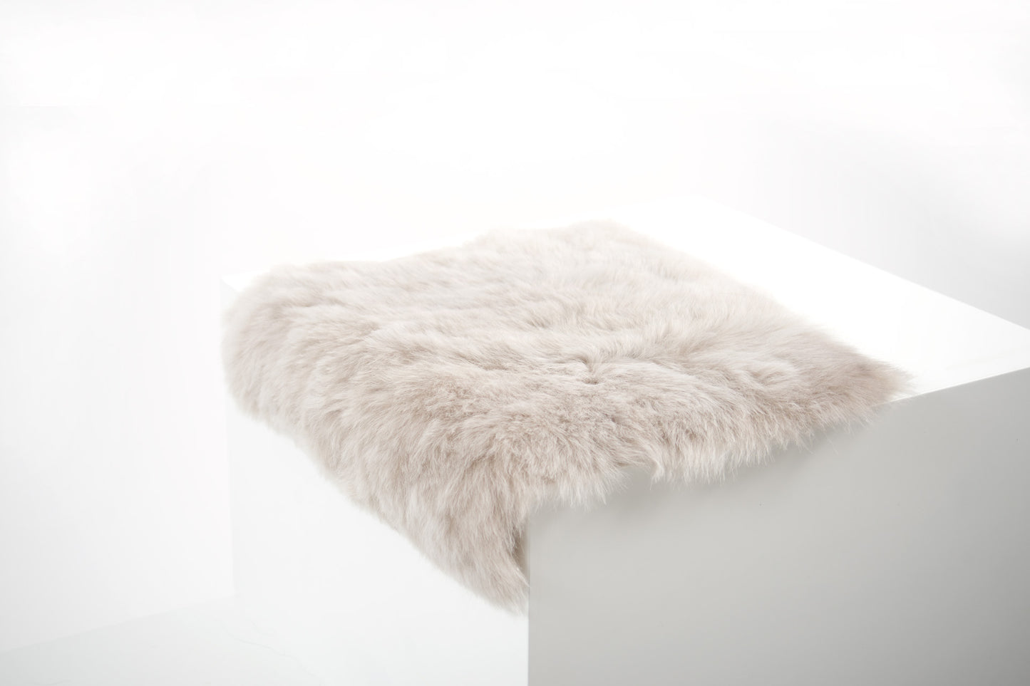 Shorn Linen Icelandic Sheepskin Chair Pad - Black Sheep (White Light)