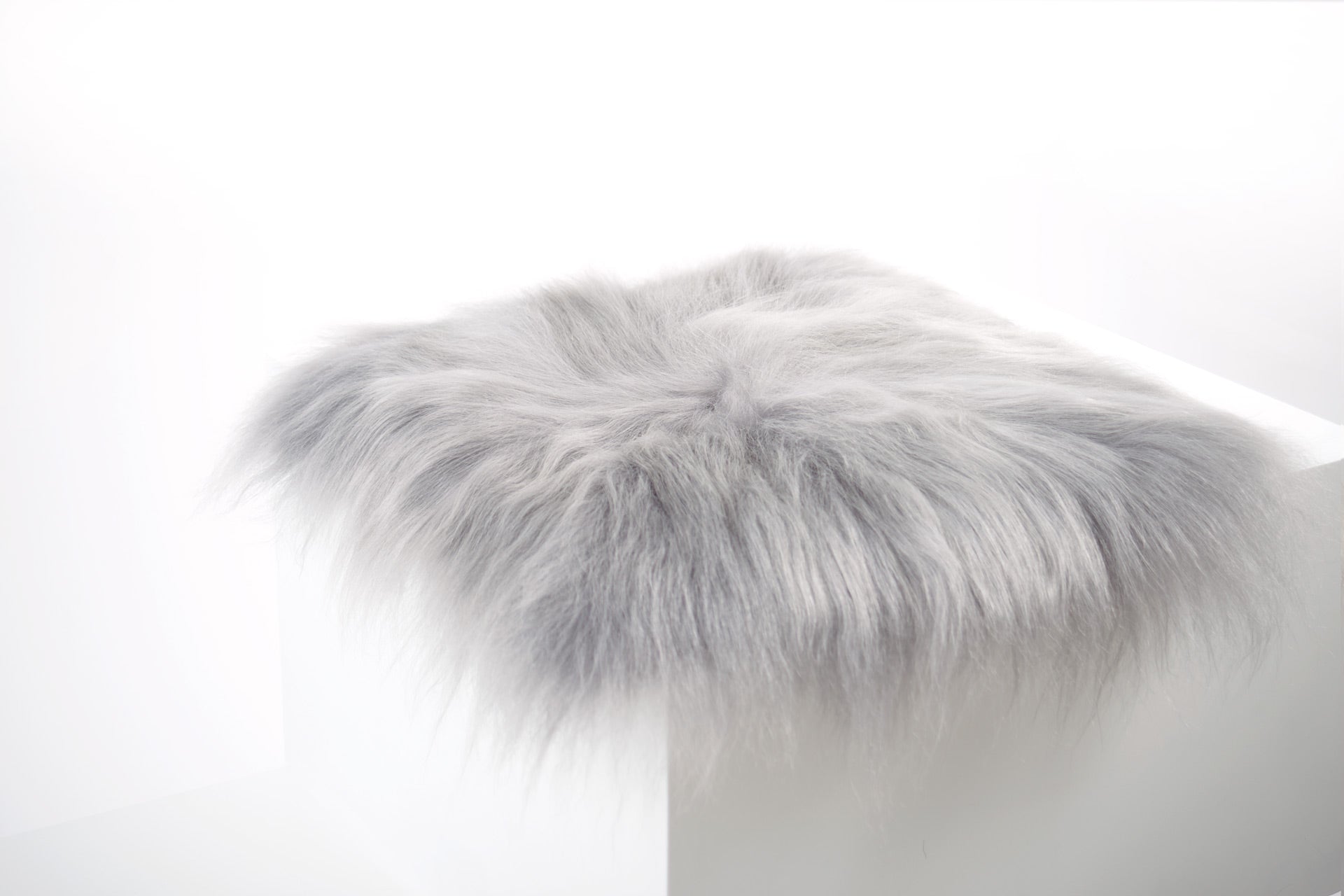 Silver Icelandic Sheepskin Chair Pad - Black Sheep (White Light)