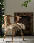 Brown Icelandic Sheepskin Chair Pad - Black Sheep (White Light)
